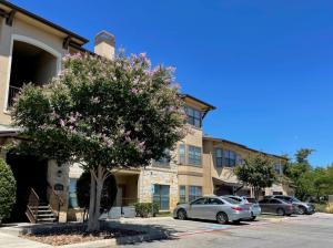 Apartments in San Antonio, TX - Exterior-Building-and-Parking-Area